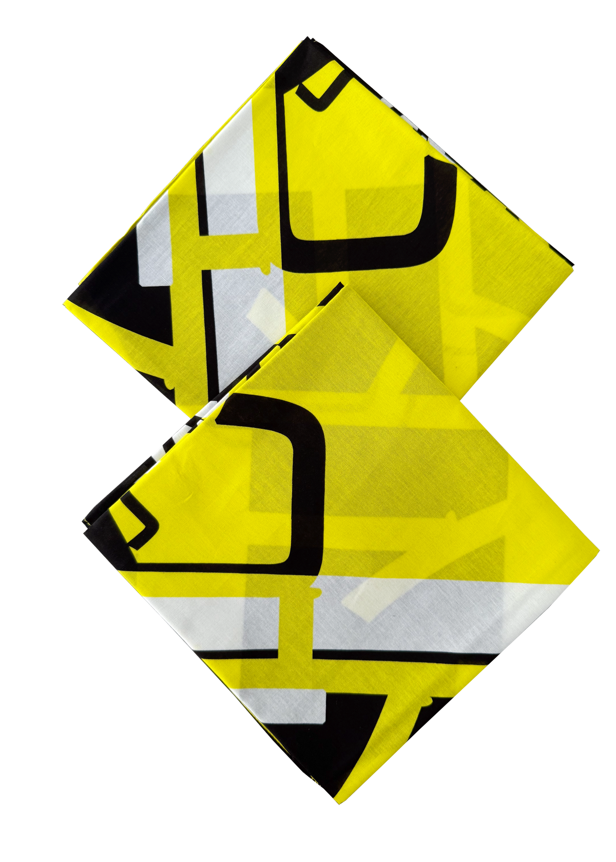 Two yellow geometric patterned napkins on a white background